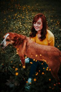 Redbone Coonhound enjoy with her owner